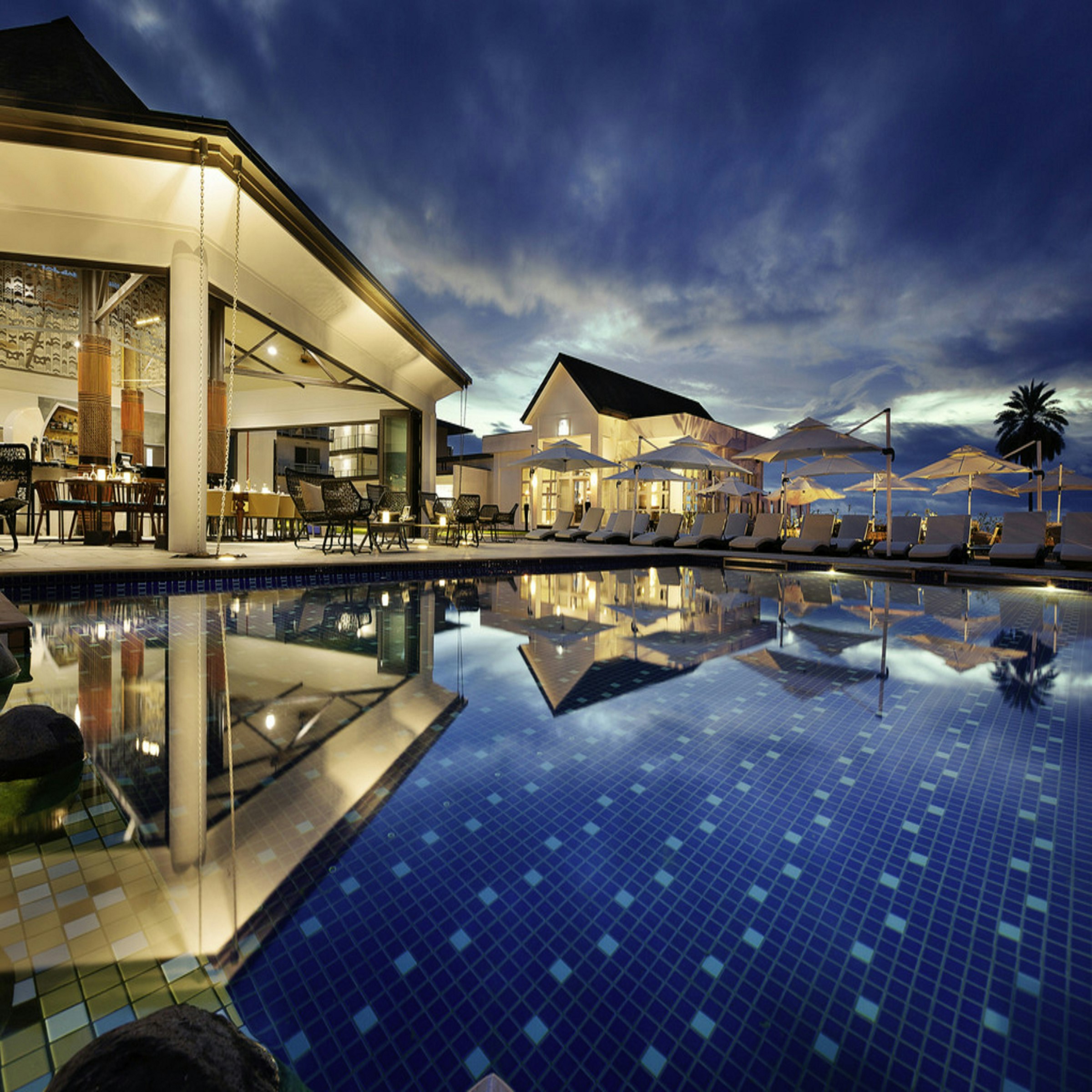 Infinity pool overlooking turquoise tropical waters